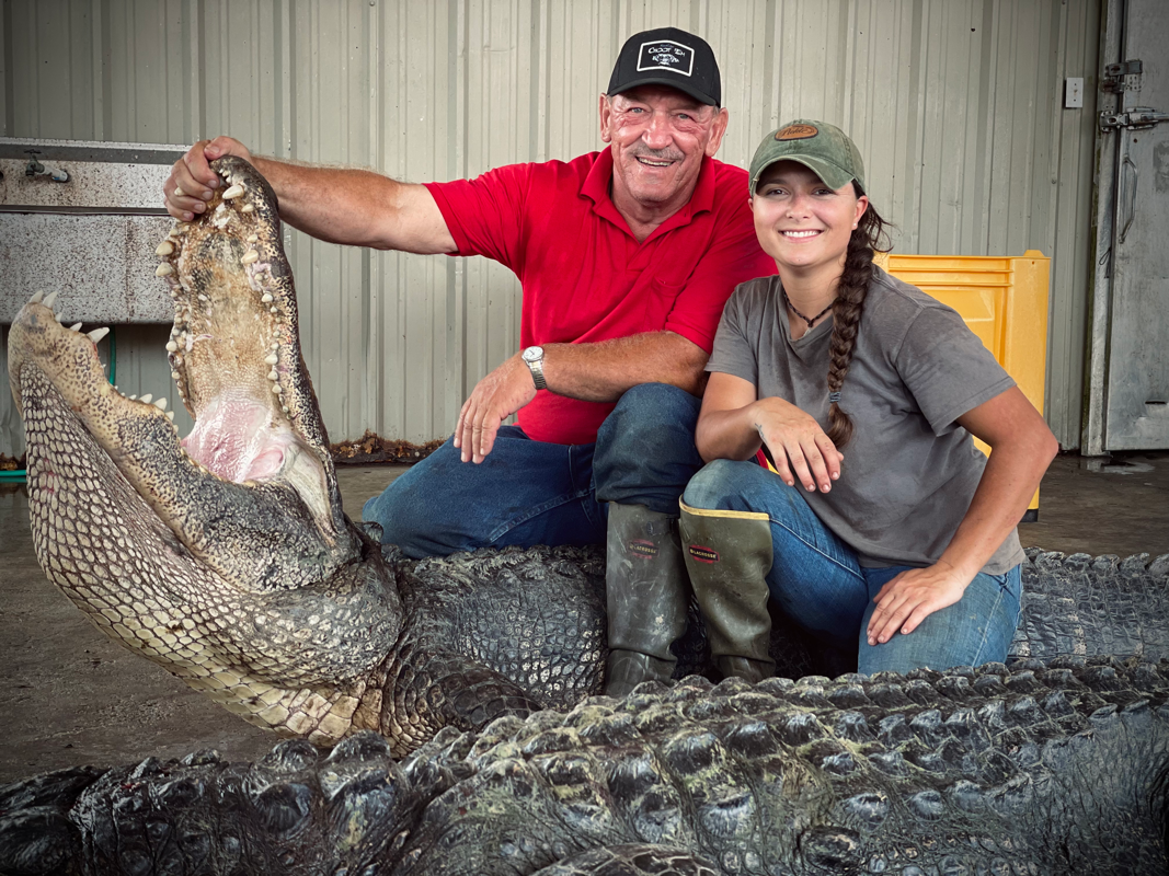 Autographed Pickle Wheat 8x10 photo (Troy and Pickle with Alligator